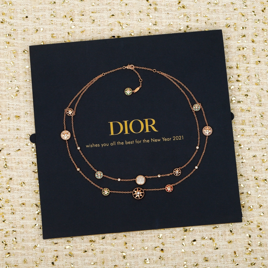 Dior Compass Rose necklace Available in yellow gold silver rose gold metal tones with clear diamond accents and multicolor enamel compass details 42cm with 5cm extender
