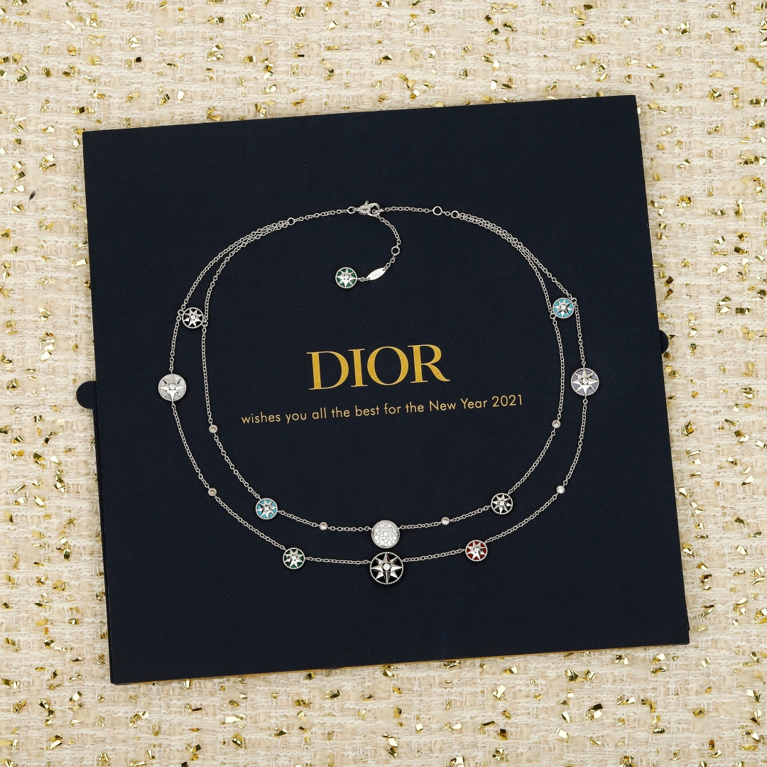Dior Compass Rose necklace Available in yellow gold silver rose gold metal tones with clear diamond accents and multicolor enamel compass details 42cm with 5cm extender