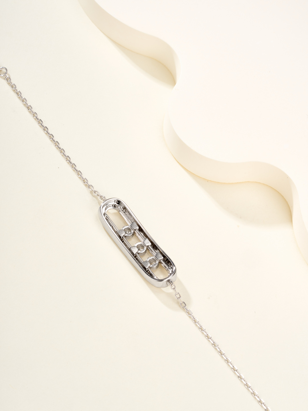 Messika Baby Move bracelet available in brushed silver-tone metal with clear round stones and brushed rose gold-tone metal with clear round stones adjustable 16-19cm