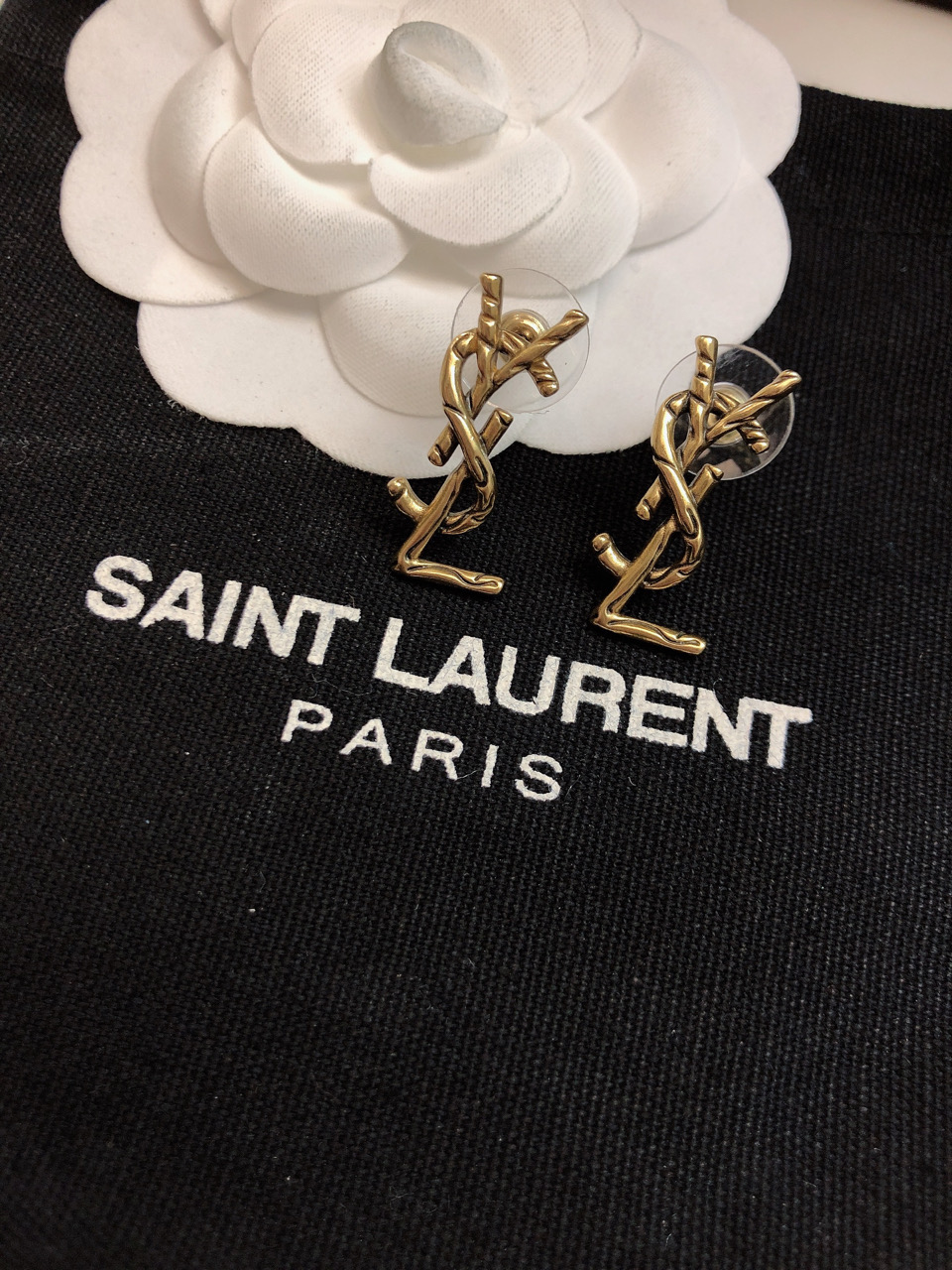 Saint Laurent CALL ME Twisted YSL Monogram earrings antique gold tone metal no gemstones 2 5cm stud length
