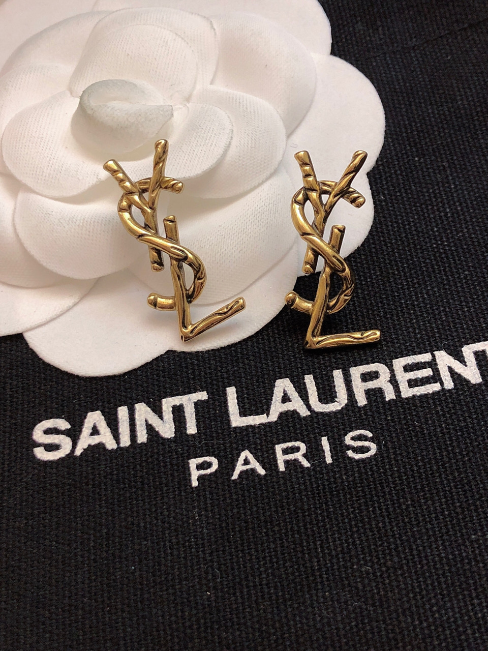 Saint Laurent CALL ME Twisted YSL Monogram earrings antique gold tone metal no gemstones 2 5cm stud length