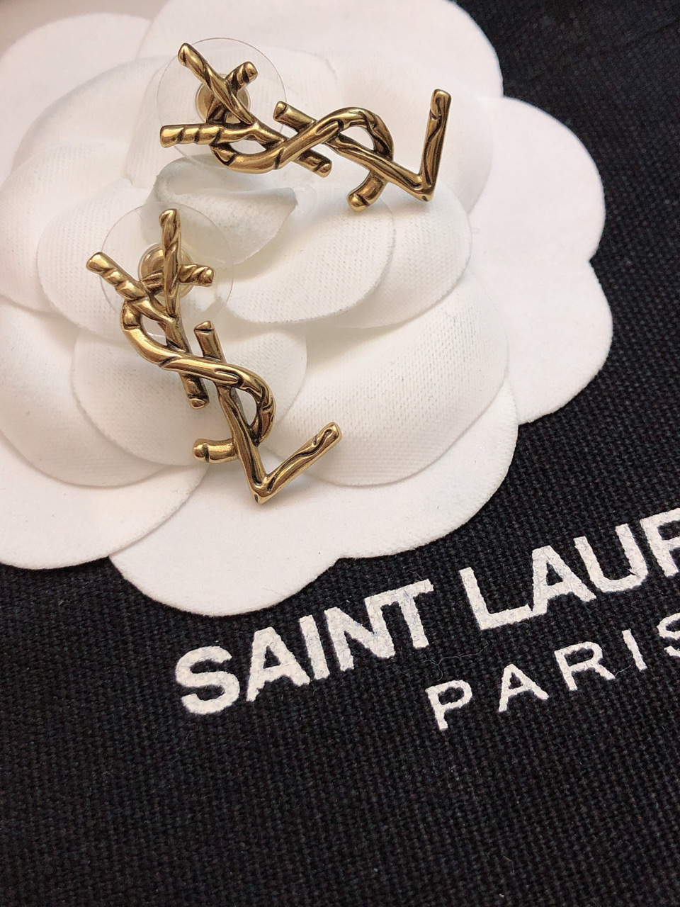 Saint Laurent CALL ME Twisted YSL Monogram earrings antique gold tone metal no gemstones 2 5cm stud length