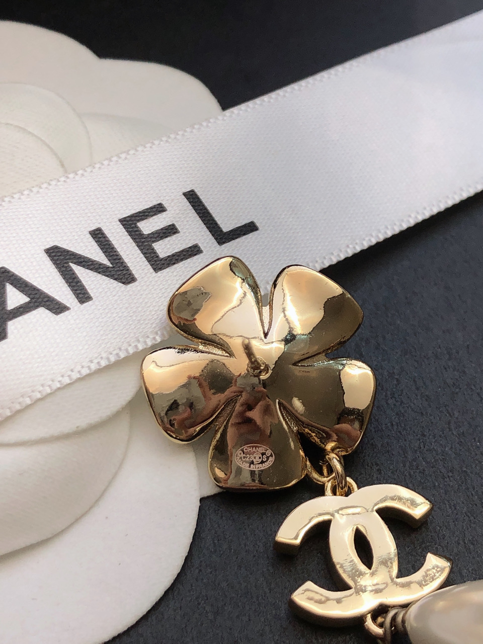 Chanel CC Camellia Teardrop Pearl Drop Earrings earrings Gold-tone metal clear crystal white pearl 4 5cm drop length