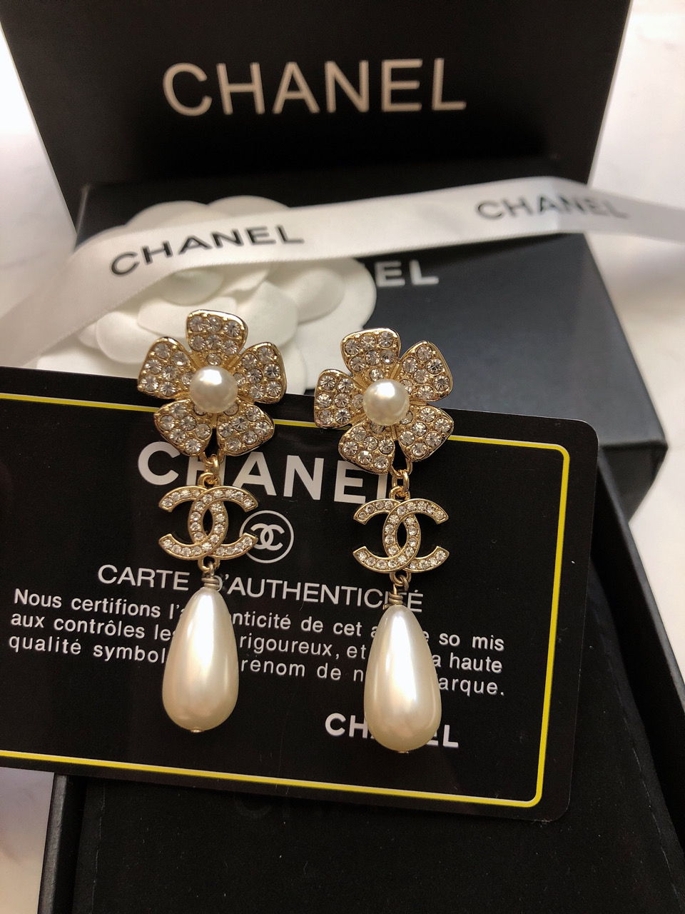 Chanel CC Camellia Teardrop Pearl Drop Earrings earrings Gold-tone metal clear crystal white pearl 4 5cm drop length