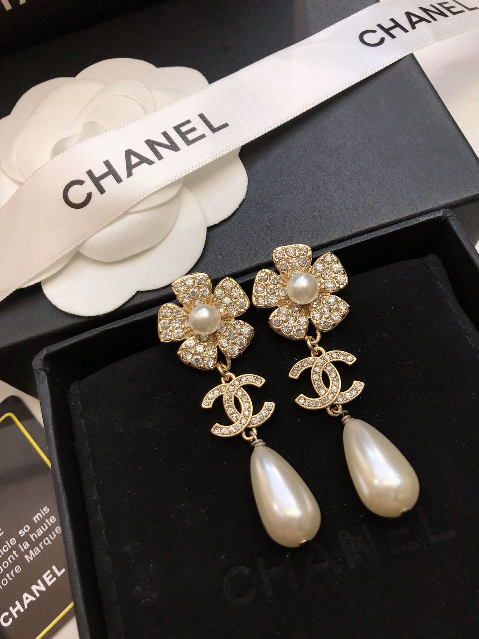 Chanel CC Camellia Teardrop Pearl Drop Earrings earrings Gold-tone metal clear crystal white pearl 4 5cm drop length