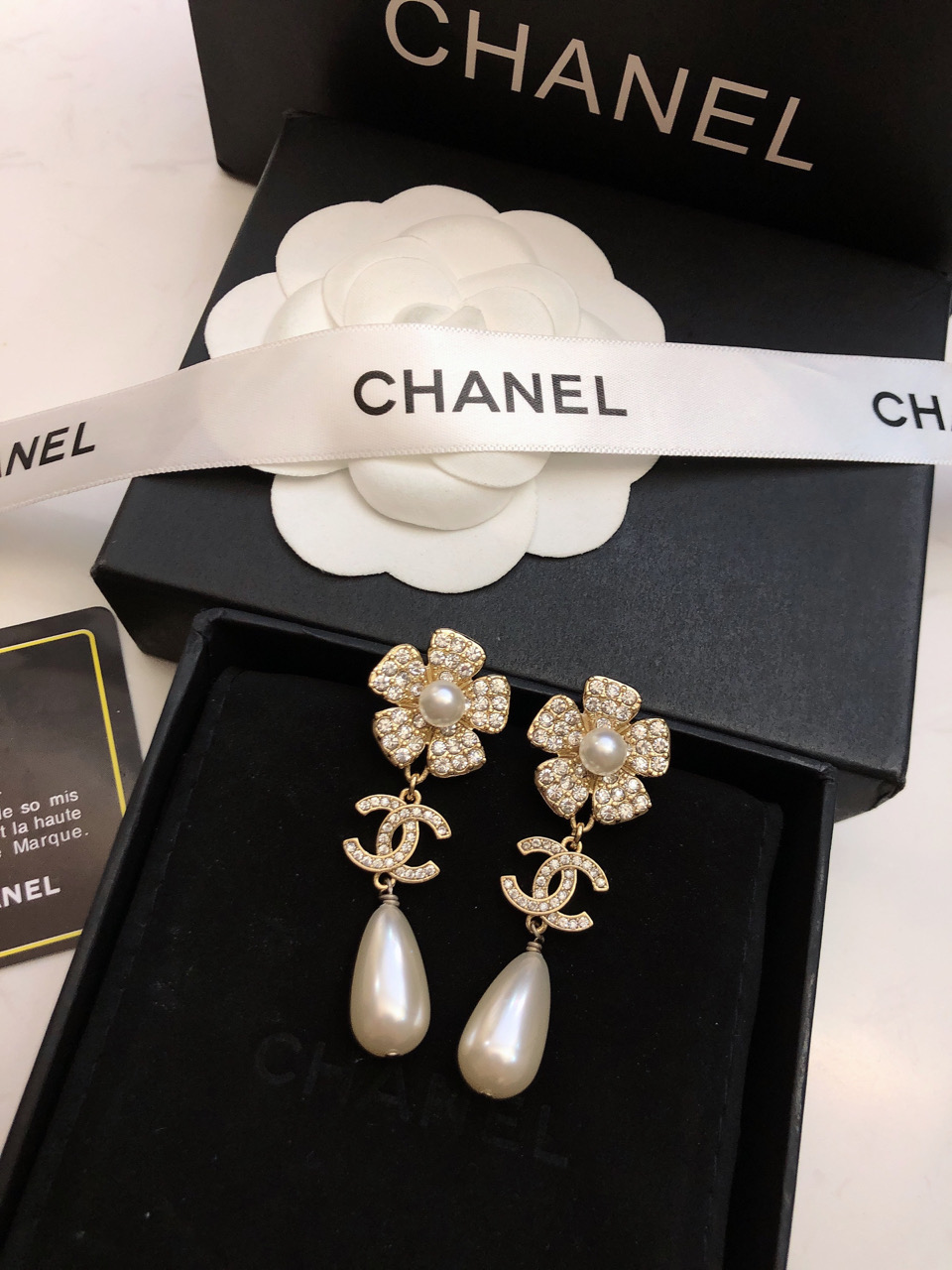 Chanel CC Camellia Teardrop Pearl Drop Earrings earrings Gold-tone metal clear crystal white pearl 4 5cm drop length