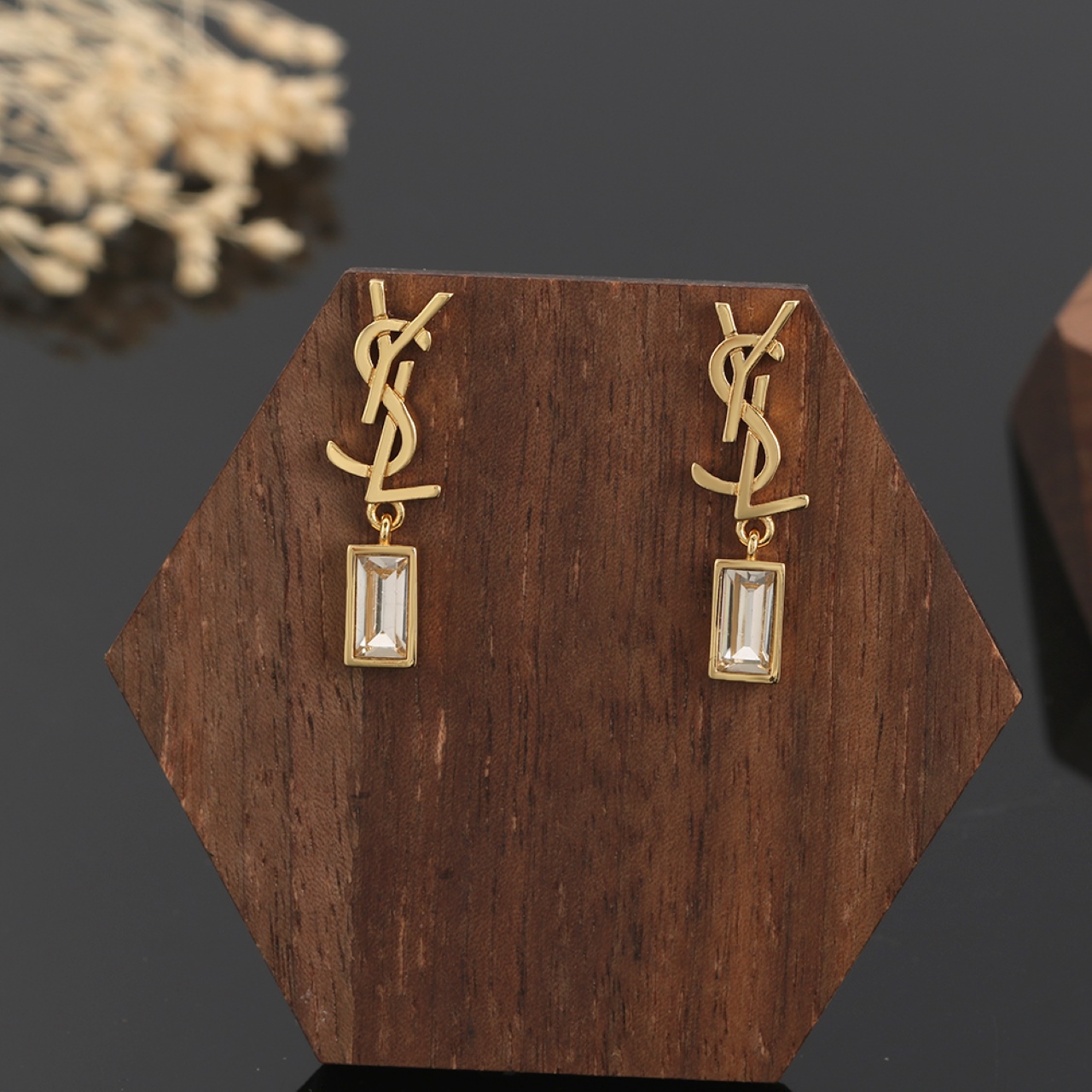 Saint Laurent Cassandre YSL Monogram Baguette Crystal Drop Earrings earrings Gold-tone metal with clear baguette-cut crystals also available in silver-tone metal with clear baguette-cut crystals 2 2cm drop length