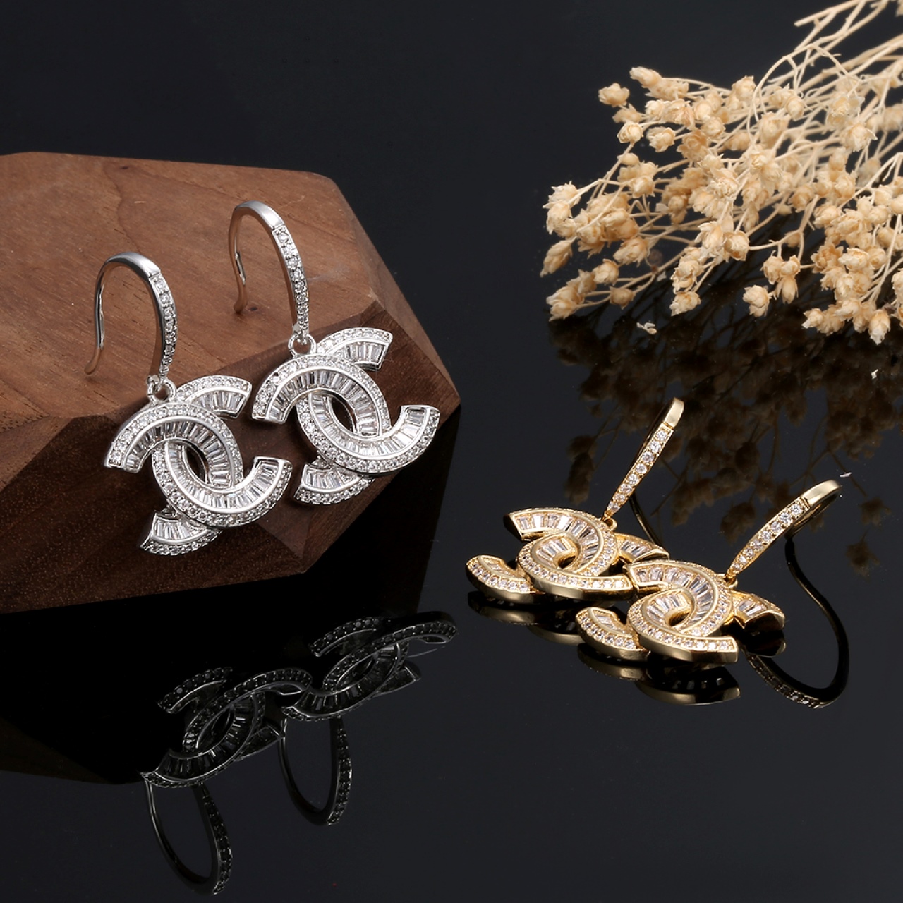 Chanel CC Baguette Crystal Drop Earrings earrings Gold-toned metal with clear baguette and round-cut crystals 2 5cm total drop length