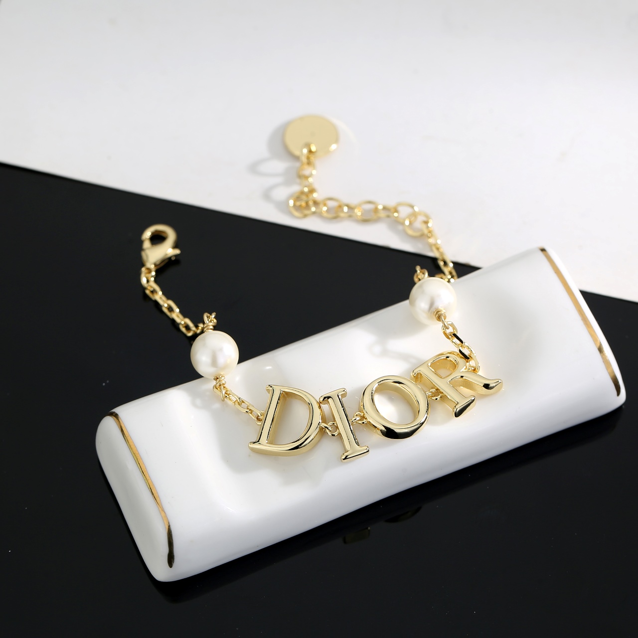 Dior D I O R Logo Pearl Bracelet bracelet gold-tone metal with white resin pearls 18cm with 3cm extender chain