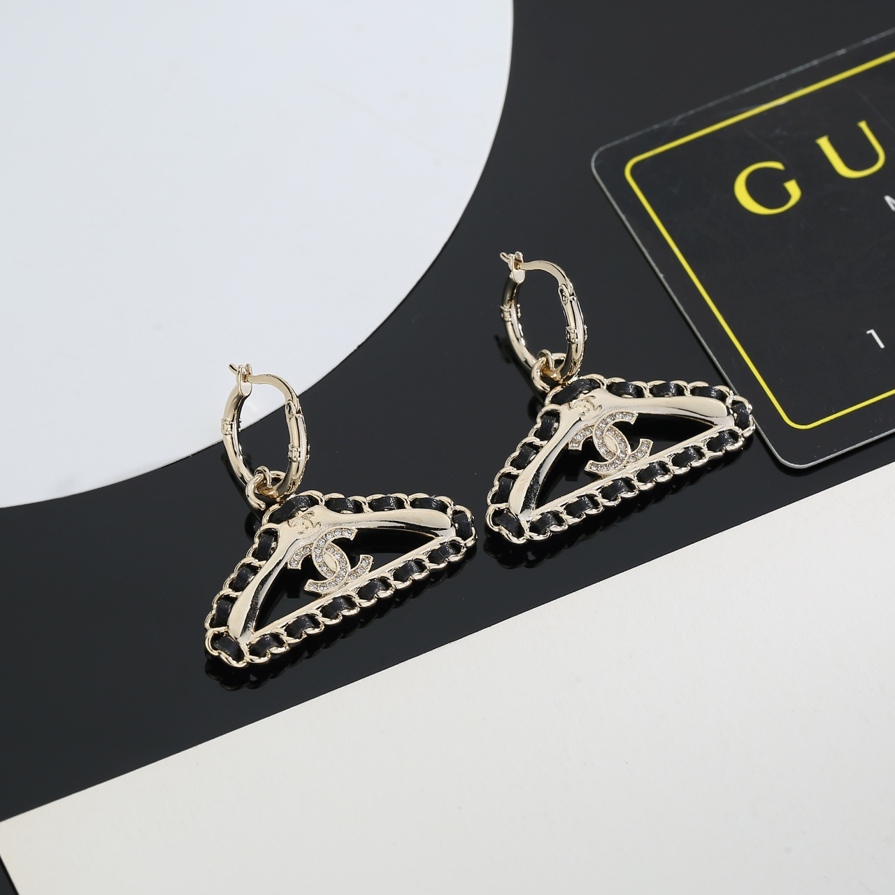 Chanel CC Hanger Charm Hoop Earrings earrings light gold-tone metal black leather chain inlay clear crystal pave CC logo 1 5cm hoop diameter 3 5cm total drop length