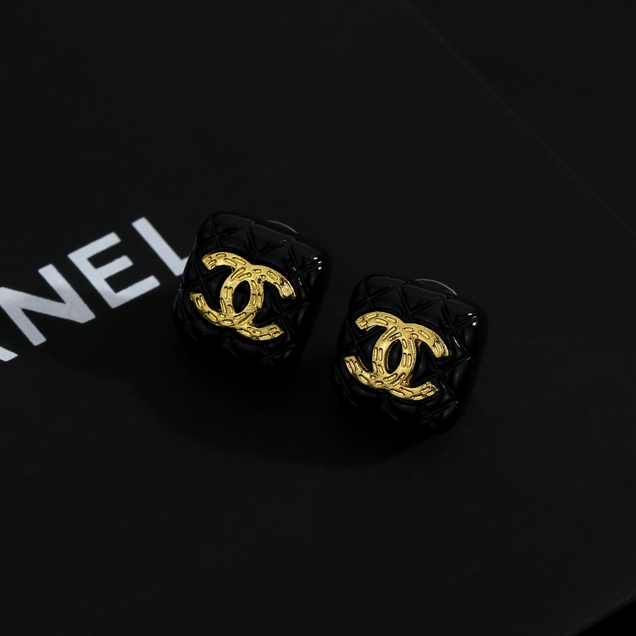 Chanel CC Quilted Square Stud Earrings earrings Black resin with gold-tone metal CC logo 1 5cm